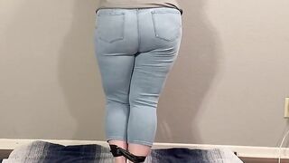 Sexy girl bond and made to pee in tight jeans