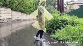 Teen in yellow raincoat flashes pussy outdoors in the rain