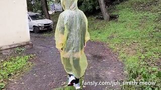 Teen in yellow raincoat flashes pussy outdoors in the rain