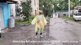 Teen in yellow raincoat flashes pussy outdoors in the rain