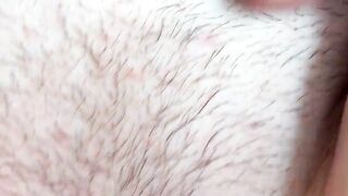 Cum flows from a meaty, swollen and fucked up pussy. Close-up. Amateur video.