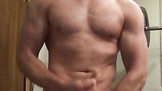 Oiled Muscular Daddy hunk with huge 7 inch cock flexes big muscles and cums after a hard workout