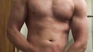 Oiled Muscular Daddy hunk with huge 7 inch cock flexes big muscles and cums after a hard workout