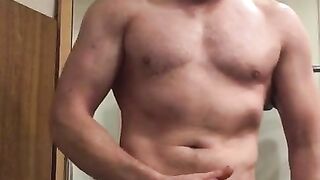 Oiled Muscular Daddy hunk with huge 7 inch cock flexes big muscles and cums after a hard workout