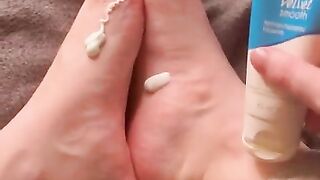 Rubbing lotion on my petite feet