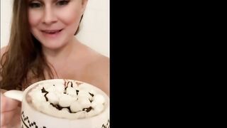 Naked milf with big tits tries hot chocolate