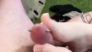 Foot job on pierced penis