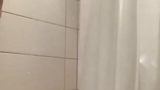 Milf with big tits shaving in the shower