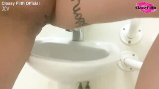 Classy Filth pisses in public sink