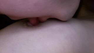 I lick my girlfriend's nipples slobberingly. She moans loudly in pleasure