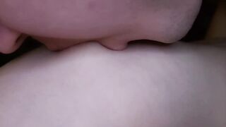 I lick my girlfriend's nipples slobberingly. She moans loudly in pleasure