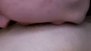 I lick my girlfriend's nipples slobberingly. She moans loudly in pleasure