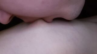 I lick my girlfriend's nipples slobberingly. She moans loudly in pleasure