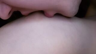 I lick my girlfriend's nipples slobberingly. She moans loudly in pleasure