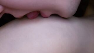 I lick my girlfriend's nipples slobberingly. She moans loudly in pleasure