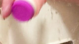 Fuck herself with dildo in shower