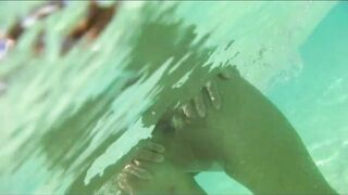 A Japanese wife swimming naked in the sea of an island.