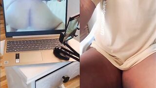 Ebony masturbates & reacts to lesbian porn