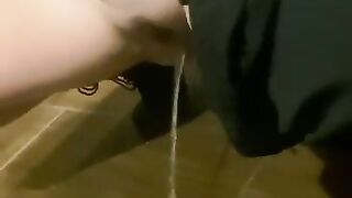 Fat bitch pissed on the floor in a public toilet