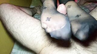 Amateur wife footjob in black pantyhose