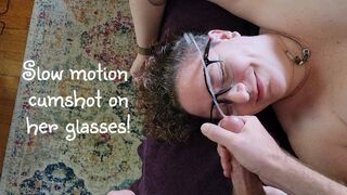 Slow motion cumshot on her glasses!