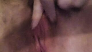 Horny housewife fingers herself to orgasm.