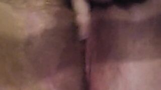 Horny housewife fingers herself to orgasm.