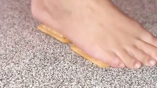 Tiny feet Crush a Cracker