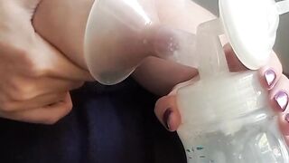 Squeezing and pumping breast.