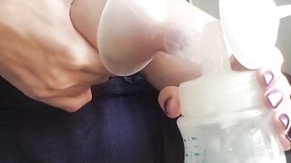 Squeezing and pumping breast.