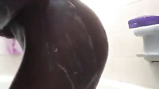 Black Girl Plays With Shower Head