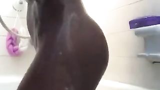 Black Girl Plays With Shower Head