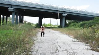 Za Za strip under the bridge with trucks