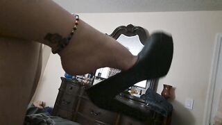 Milf angles her new heels while laying in bed