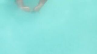 Thick bbw milf gets wet in the pool and bounces her huge size G natural tits in the water.