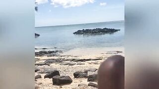 Public beach Mauritius with watcher