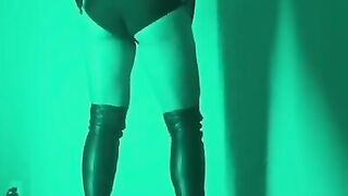 Milf in thigh high boots on vibrating platform