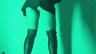 Milf in thigh high boots on vibrating platform