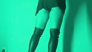 Milf in thigh high boots on vibrating platform