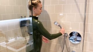 IWantSheena stripping down latex under the shower.