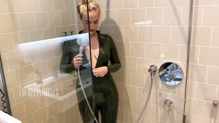 IWantSheena stripping down latex under the shower.