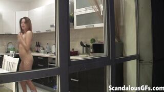 The hot girl-next-door is naked and somehow messing with me through her kitchen windows