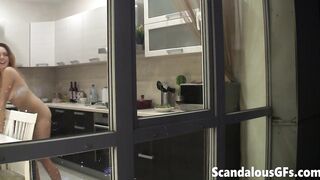 The hot girl-next-door is naked and somehow messing with me through her kitchen windows