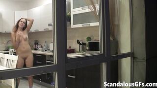 The hot girl-next-door is naked and somehow messing with me through her kitchen windows