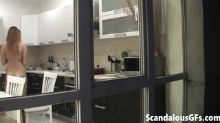 The hot girl-next-door is naked and somehow messing with me through her kitchen windows