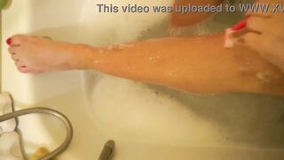 MILF shaves her legs and then rubs them with cream