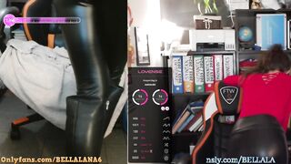 Teacher in leather leggings and boots is masturbating under her desk during the class (lush control)