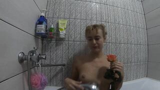 Nude girl in the bath and shower in pussy