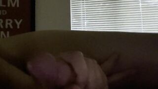 Thick cock gets jerked off until a cumshot