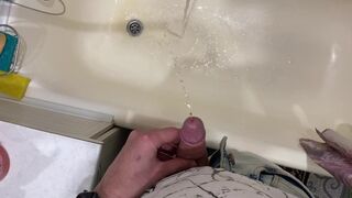 Pissing neatly in the bathroom with a big beautiful dick POV